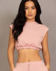 Calla Lily Cosmetics + CL kids pink cotton French terry crop top with elastic hem and wide-leg pants.