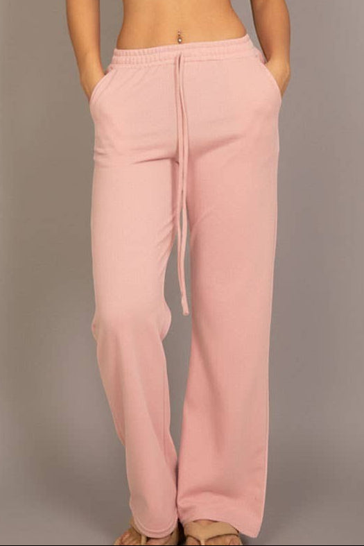 Calla Lily Cosmetics + CL kids pink cotton French terry crop top with elastic hem and wide-leg pants.