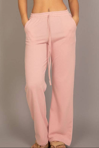 Calla Lily Cosmetics + CL kids pink cotton French terry crop top with elastic hem and wide-leg pants.