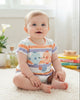 Calla Lily Cosmetics + CL kids pastel striped cotton bodysuit with two pufferfish graphic and ruffled sleeves.