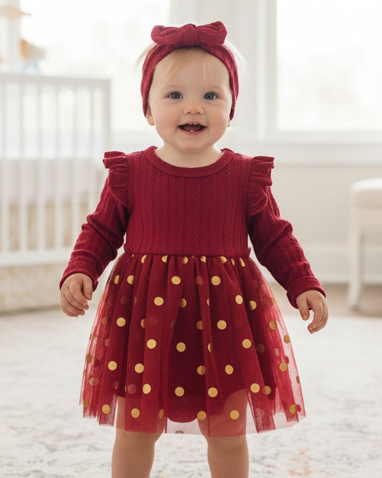 Calla Lily Cosmetics + CL kids red baby dress with gold polka dots and matching headband. Long sleeves, polyester-spandex blend.