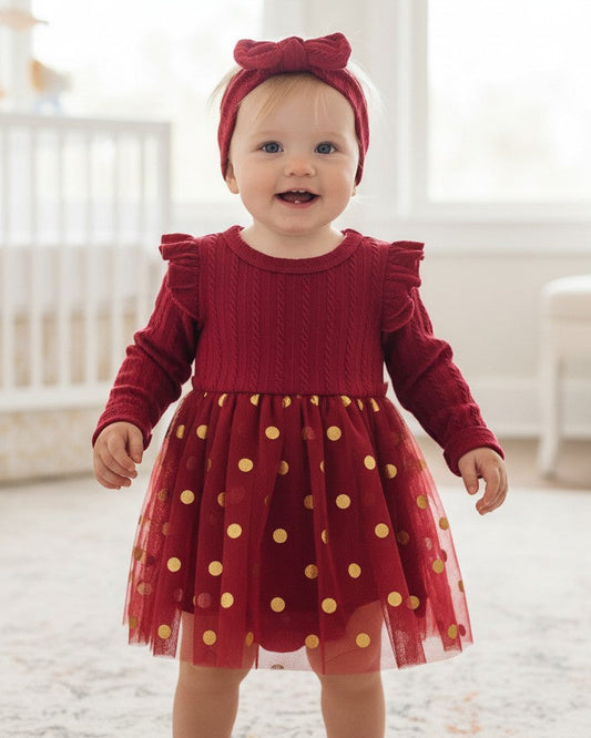 Calla Lily Cosmetics + CL kids red baby dress with gold polka dots and matching headband. Long sleeves, polyester-spandex blend.