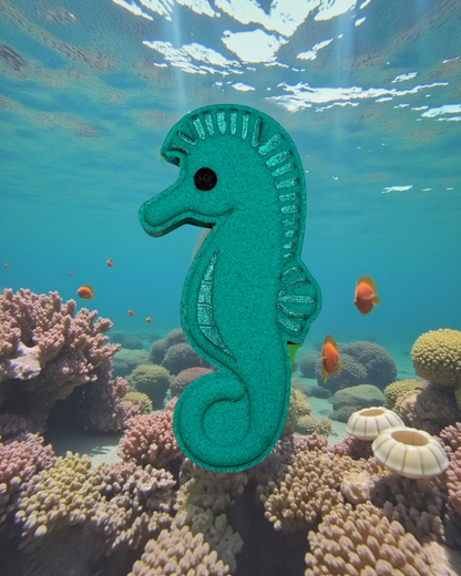 Calla Lily Cosmetics + CL kids teal seahorse-shaped bath bomb with floral scent and moisturizing cocoa butter