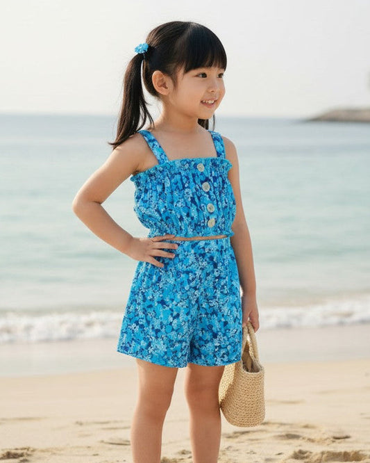 Calla Lily Cosmetics + CL kids Toddler's blue floral smocked tank top and shorts set. Cotton-polyester blend.
