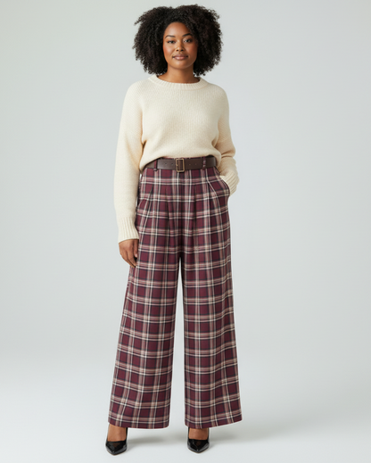 Calla Lily Cosmetics + CL kids wine red plaid wide leg pants with pleated front and belted waist on a model