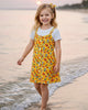 Calla Lily Cosmetics + CL kids yellow floral rayon dress with white ribbed tee and matching scrunchie. Button front.