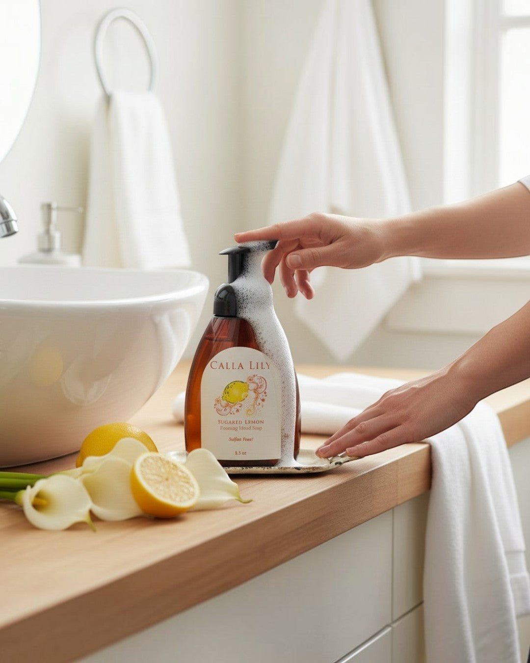Calla Lily Sugared Lemon foaming hand soap in an 8oz amber bottle with a black pump. Sulfate-free.