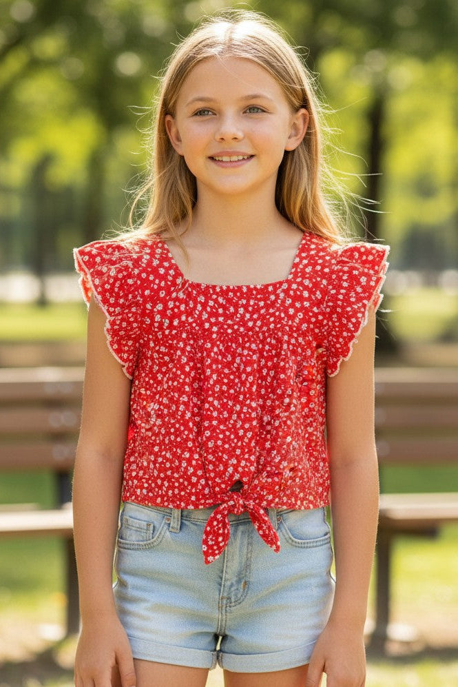 Calla Lily Cosmetics + CL kids red rayon top with white floral print, square neck, ruffle sleeves, and tie-front detail.