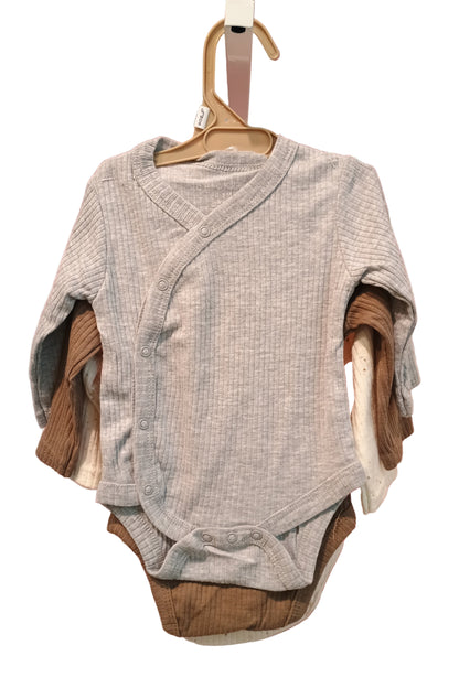 Grey baby onesie against a white background