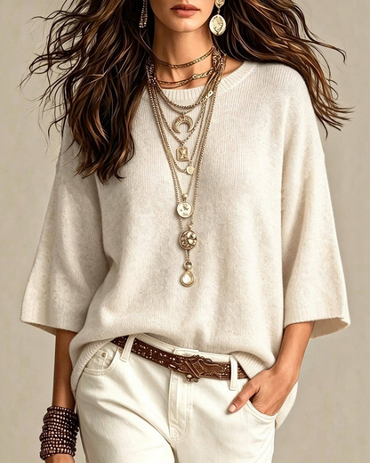 Calla Lily Cosmetics + CL kids creamy neutral 3/4 sleeve knit sweater styled with layered gold necklaces and white jeans