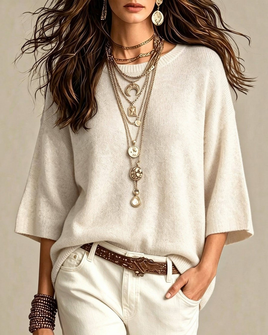 Calla Lily Cosmetics + CL kids creamy neutral 3/4 sleeve knit sweater styled with layered gold necklaces and white jeans
