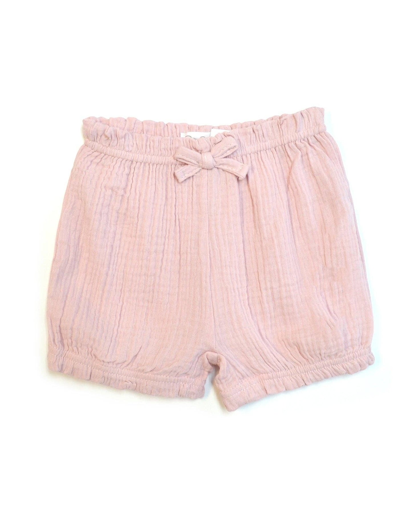 Pink shorts with a bow waistband on a white background