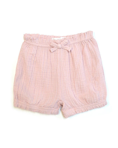 Pink shorts with a bow waistband on a white background