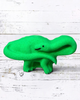 Calla Lily Cosmetics + CL kids green brontosaurus dinosaur bath bomb with citrus scent on a white wood background