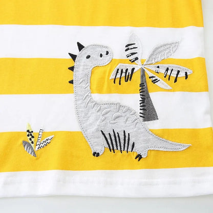 Striped towel with a dinosaur design on a yellow and white background