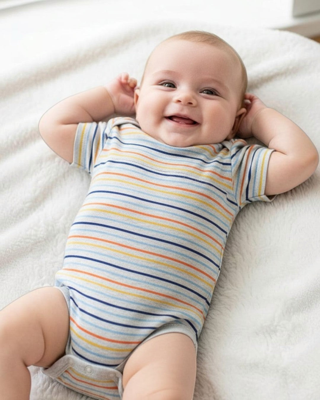 Striped baby bodysuit on a white background