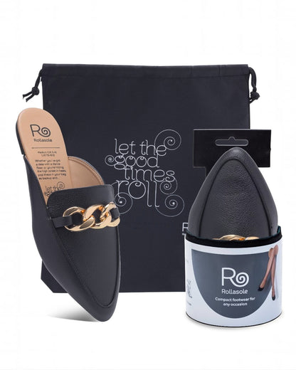Black slip-on shoes with gold chain detail, black pouch, and white container with 'Ro' branding on a white background.