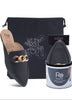Black slip-on shoes with gold chain detail, black pouch, and white container with 'Ro' branding on a white background.
