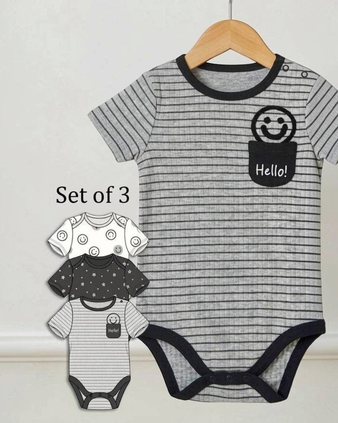 Set of three baby onesies with a striped design and 'Hello!' print on a hanger.