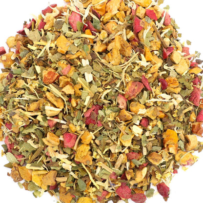 A circular pile of loose-leaf herbal tea blend on a solid white background, featuring dried green leaves, yellow-orange citrus pieces, and pink dried fruit.