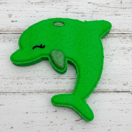 Green dolphin-shaped object on a white background