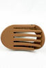 Brown hair clip on a white background