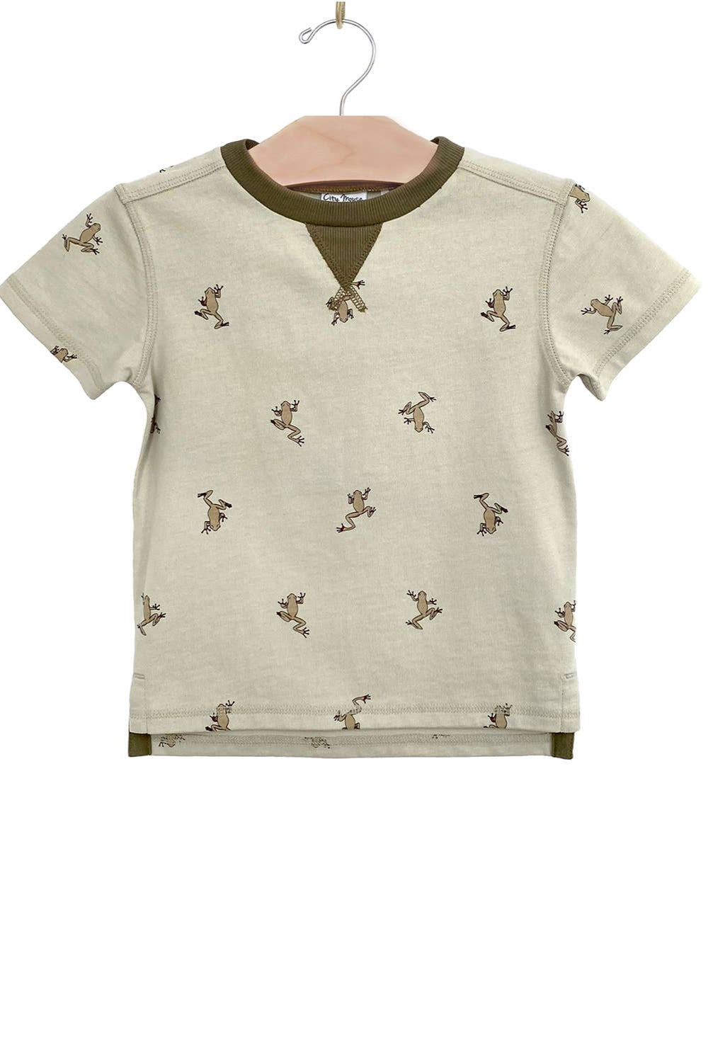 Children's t-shirt with small prints on a hanger against a white background