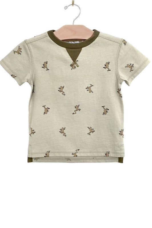 Children's t-shirt with small prints on a hanger against a white background