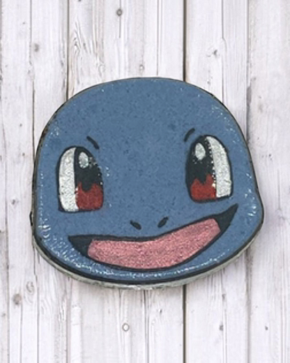 Calla Lily Cosmetics + CL kids blue Squirtle bath bomb, hand-painted with mica powder for a fun kids bath experience.