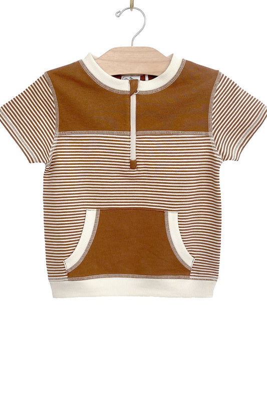 Children's brown and beige striped shirt on a hanger against a white background