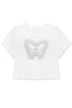 White t-shirt with a butterfly design on a white background