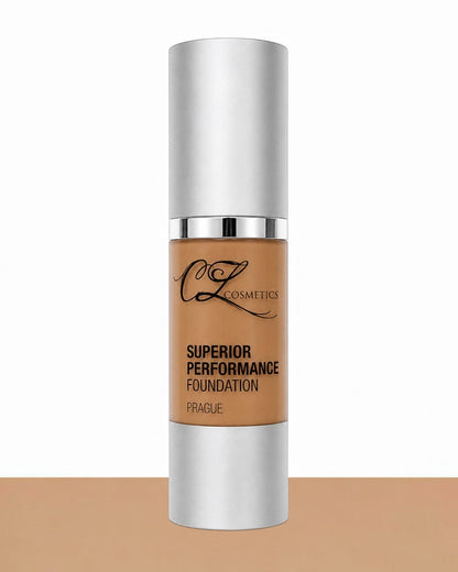 Foundation bottle with silver cap and brown body on a white background
