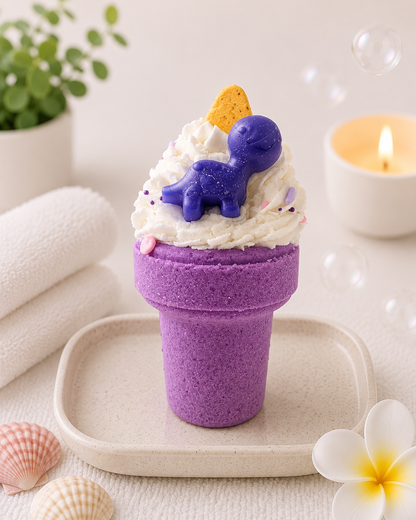 Purple toy ice cream cone with a dinosaur on a white surface with a candle and plant in the background.