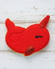 Red narwhal-shaped patch on pebbles