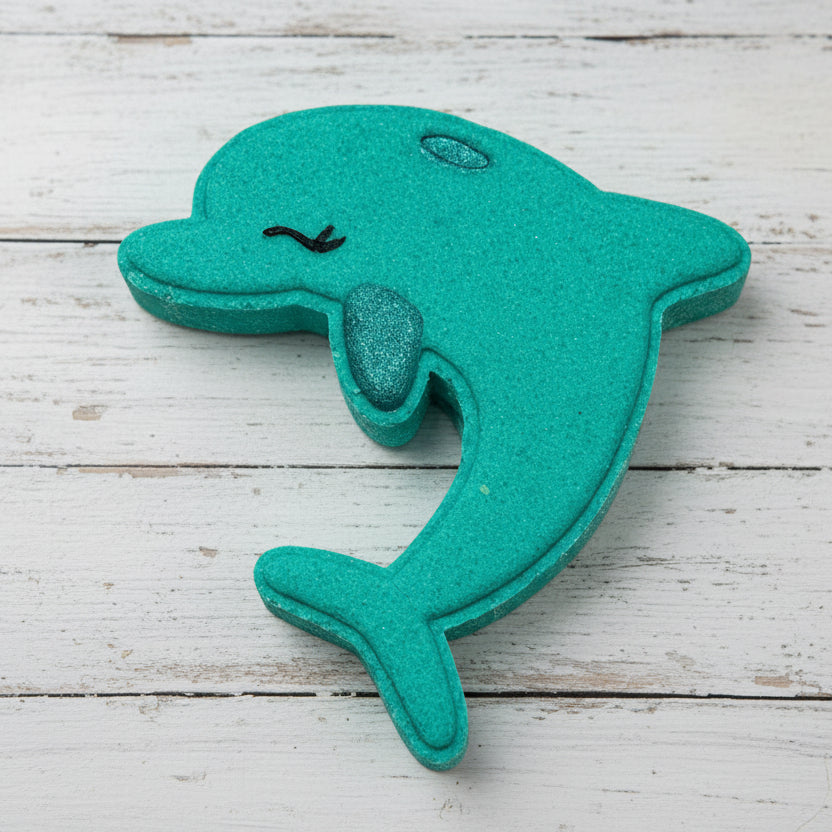 Teal dolphin-shaped object on a white background