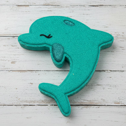 Teal dolphin-shaped object on a white background