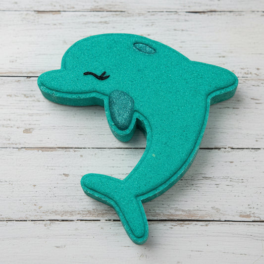 Teal dolphin-shaped object on a white background