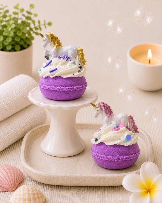two unicorn toys on two purple bath bombs